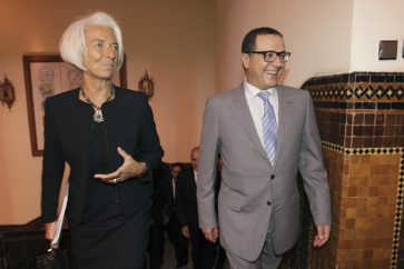 International Monetary Fund Managing Director Christine Lagarde (L) talks with Moroccan Finance Minister Mohamed Boussaid, as she arrives for a meeting at the Finance Ministry in Rabat, May 8, 2014. IMF chief Lagarde said on Thursday that Arab nations switching to democracy face chronic unemployment and must try to nurture a strong middle class to support them through their transition. REUTERS/Stringer (MOROCCO - Tags: POLITICS BUSINESS) - RTR3OBY2