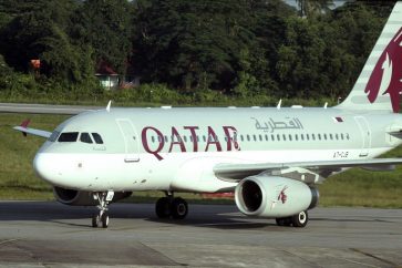 A Qatar Airways plane sits on the tarmac at Yangon International Airport in Yangon, Myanmar, Thursday, Oct. 4, 2012. Qatar Airways will resume flying to Myanmar's biggest city in the latest indicator of international interest in the Southeast Asian nation as it boosts its welcome to investors and tourism. The airline said in a statement Wednesday that it will relaunch its Doha-Yangon route that had been suspended in January 2008. It said the thrice-weekly flights will resume this Friday. (AP Photo/Khin Maung Win)/MYN101/248037477813/1210041007
