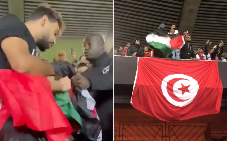 Un supporteur tunisien brandit le drapeau de la Palestine sur le stade du Parc des Princes