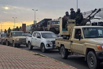 This handout picture released by the official Syrian Arab News Agency (SANA) shows members of the Syrian security forces entering the Mediterranean city of Tartous to reinforce government troops in clashes with militants loyal to deposed ruler Bashar al-Assad, on March 7, 2025. (Photo by SANA / AFP) / == RESTRICTED TO EDITORIAL USE - MANDATORY CREDIT "AFP PHOTO / HO / SANA" - NO MARKETING NO ADVERTISING CAMPAIGNS - DISTRIBUTED AS A SERVICE TO CLIENTS ==